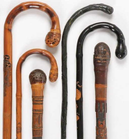 GROUP OF JAPANESE CARVED CANES