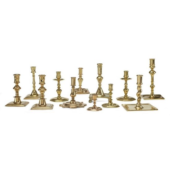 Group of twelve Continental brass candlesticks, Dutch