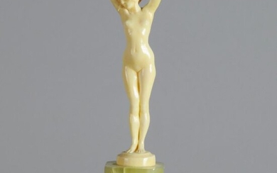 Joseph Descomps (French, 1869 ~ 1950) 'Femme Nue' - Hand carved ivory figure modelled as a naked young woman, signed Descomps. Circa 1925. Height 11 cm