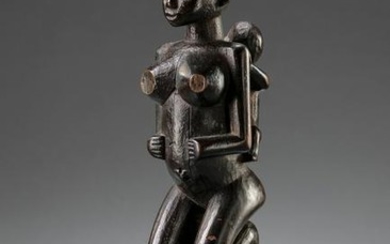 Kneeling female figure with child - D. R. Congo, Bwende