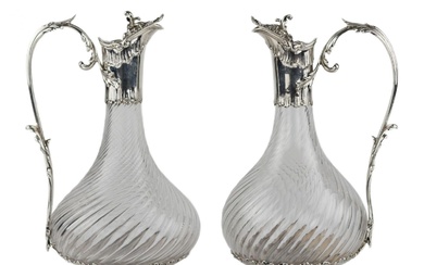 Pair of French, spiral glass wine jugs with silver. Late...