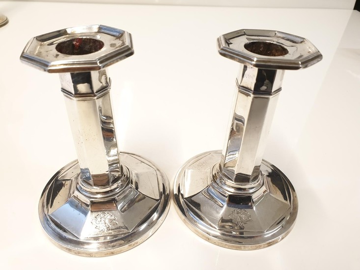 Pair of silver pillar candlesticks, filled and 4.5" tall, si...