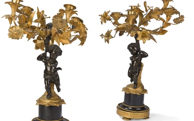 Paire de candélabres de style Louis XVI en bronze ciselé, patiné et doré et marbre...