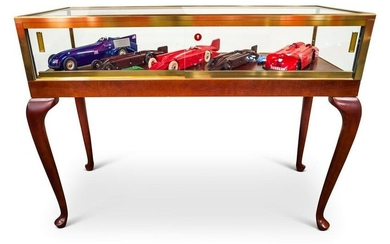 Rare Collection of Kingsbury Land Speed Record Clockwork Toys ca. 1930, With Display Case