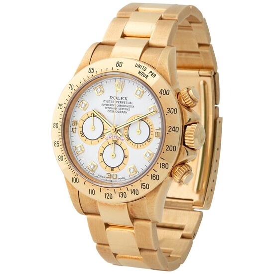 Rolex. Very Rare and Luxurious Daytona Chronograph Wristwatch in Yellow Gold, Reference 16 528, With White Diamonds Dial and Sticker
