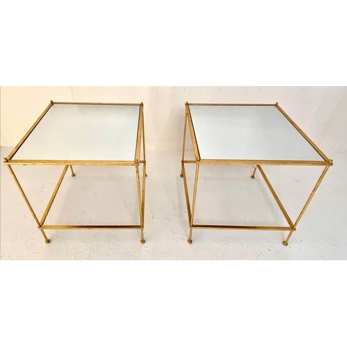 SIDE TABLES, a pair, gilt metal mirrored inserted top, two t...