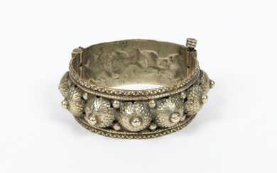 Silver bracelet with nipples type cabochons in repoussé...