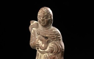 Statuette representing a standing child Roman art, Alexandria (?), 2nd-3rd century AD.