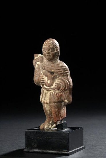 Statuette representing a standing child Roman art, Alexandria (?), 2nd-3rd century AD.