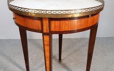 TABLE BOUILLOTTE in the Louis XVI style inlaid and topped...