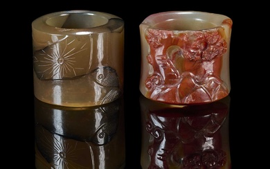 TWO CHINESE CARVED AGATE ARCHERS RINGS, QING DYNASTY, 19TH CENTURY
