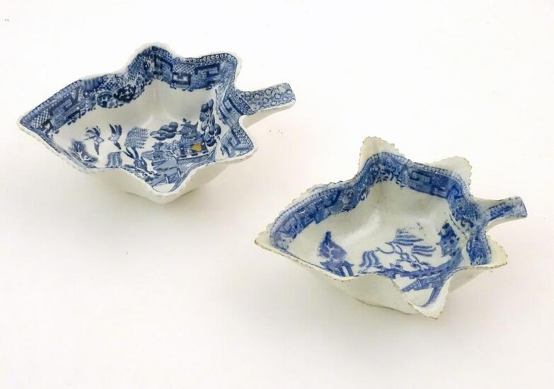 Two blue and white pickle dishes decorated with pagoda