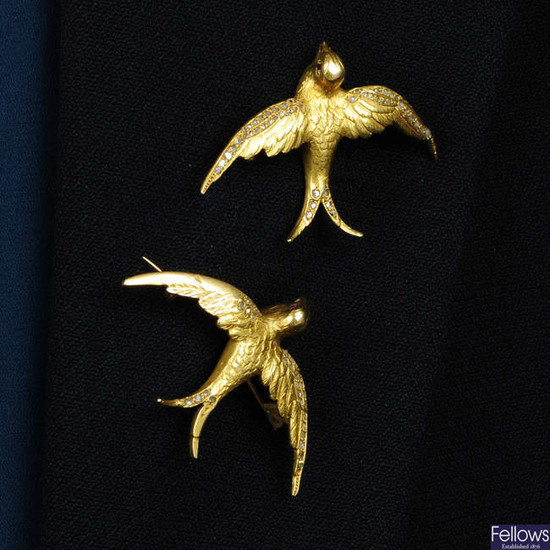 Two early 20th century 18ct gold swallow brooches, with rose-cut diamond and ruby accents.