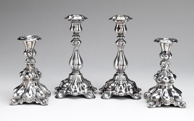 Two pairs of German silver candlesticks
