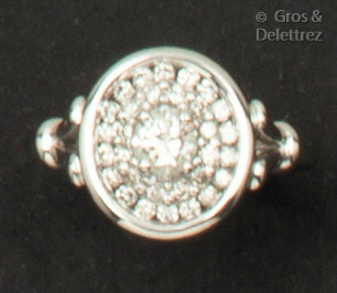 White gold ring, set with a brilliant-cut diamond...