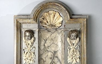 Wood panelling element with carved and painted marble...