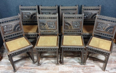 series of 8 Breton chairs in solid oak abundantly carved - Oak - mid 19th century