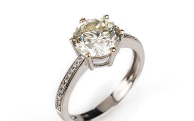 18 kt gold brilliant-ring , WG 750/000, middle brilliant approx....