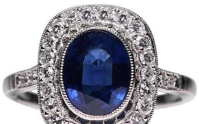 Estate Platinum Sapphires and Diamonds Ring