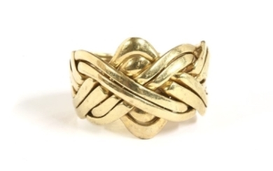 A gentlemen's 9ct gold eight row puzzle ring