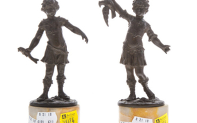 Pair of Continental patinated metal figures