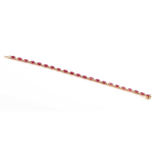 A 14ct yellow gold, diamond, and ruby bracelet, set with twe...