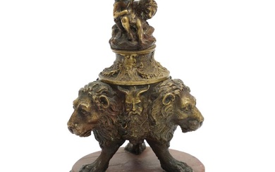 A 19th century bronze lion head ink well cast with mascarons, the...