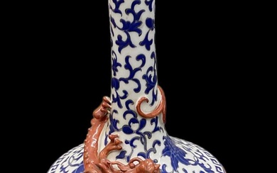 A 20th century Chinese blue and white vase, with dragon...