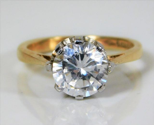 A 9ct gold ring with Tiffany style mount & paste stone 3.1g ...