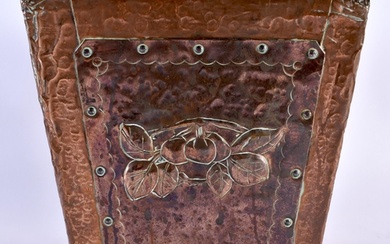 A CHARMING ARTS AND CRAFTS COPPER LINED LEAD PLANTER of unus...