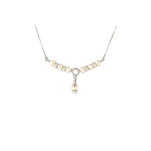 A CULTURED PEARL AND DIAMOND SET PENDANT, mounted in 18ct go...