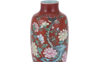 A Chinese coral-ground Famille Rose vase