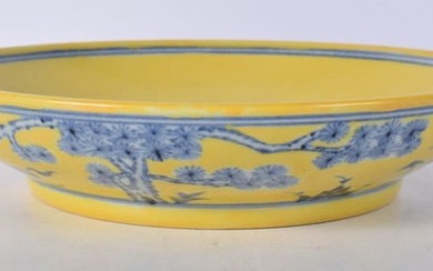 A Chinese porcelain dish decorated with trees to the interior 5 x 23.5 cm