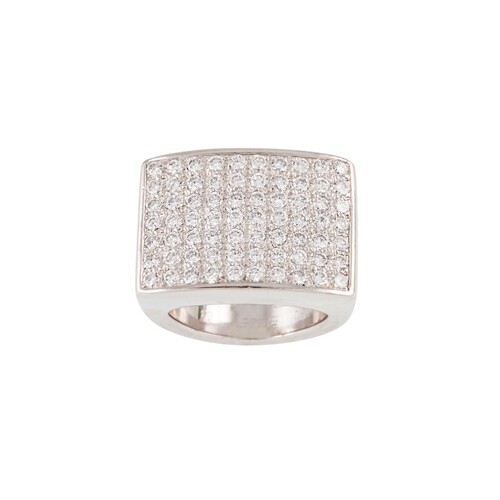 A DIAMOND CLUSTER RING BY PIAGET, the pavé set panel mounted...