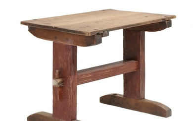 A Danish early 19th century table with solid oak top, redpainted base. H. 74. L. 98. W. 63 cm.