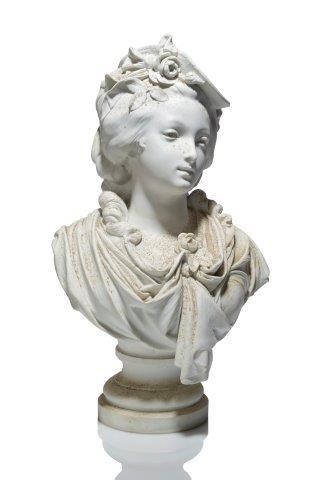 A French bisque porcelain bust of a...