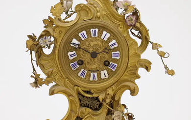 A French ormolu mantel clock by Raingo Freres, of Louis XV style,...
