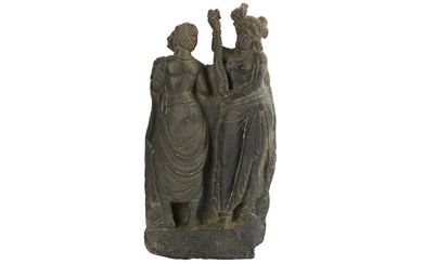 A GREY SCHIST CARVING WITH A STANDING PAIR Ancient region of Gandhara, 2nd - 3rd century