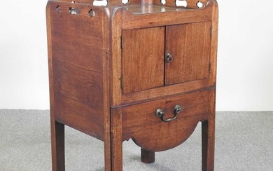A George III mahogany bedside commode, on square moulded legs...