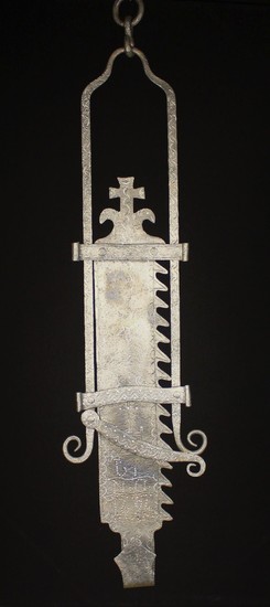 A Large 16th century Style Wrought Iron Chimney Crane with height adjustable ratchet, incised and pu