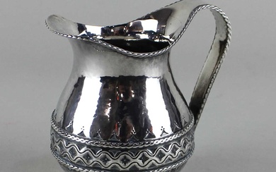 A Liberty & Co. George V silver cream jug