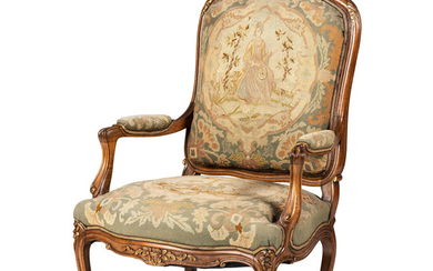 A Louis XV Style Carved Walnut and Needlework Upholstered Fauteuil
