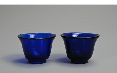 A PAIR OF CHINESE BLUE PEKING GLASS WINE CUPS, LATE QING DYN...