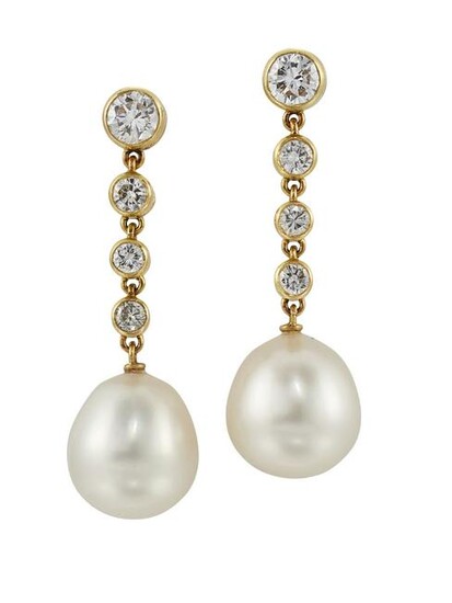A PAIR OF CULTURED PEARL AND DIAMOND EARRINGS Each
