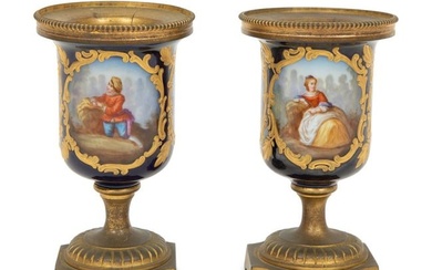 A Pair of Small Sevrés Style Porcelain and Gilt Bronze Urns
