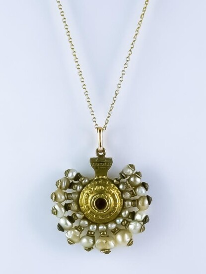 A Pearl and Garnet Pendant, Late 19th/ Early 20th...