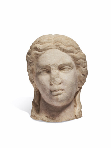 A ROMAN MARBLE HEAD OF APOLLO