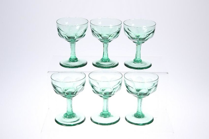 A SET OF SIX LATE VICTORIAN GREEN-GLASS CHAMPAGNE