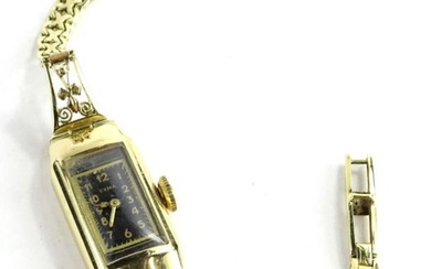 A Syma Art Deco gold watch, the strap stamped...