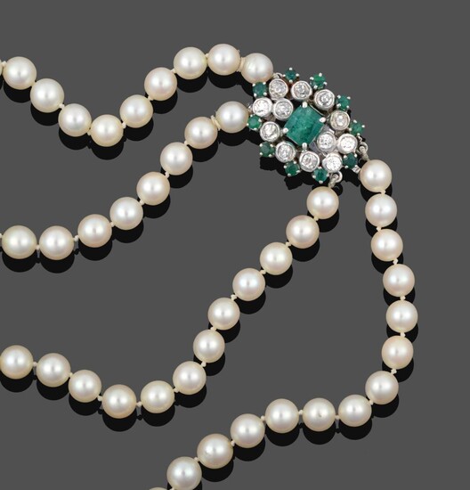 A Two Row Cultured Pearl Necklace, the 63:67 cultured pearls knotted to an oval clasp comprising of